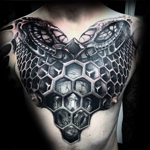 Chest tattoo featuring a 3D honeycomb pattern with detailed shading, creating an illusion of depth and texture