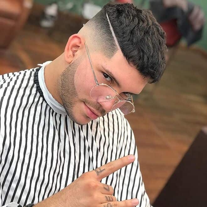 Medium length top hair and bald fade with a clean hairline