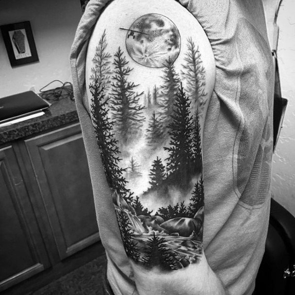 Detailed black and white forest tattoo featuring towering pine trees, a full moon, and a flowing river, capturing the serenity of nature.