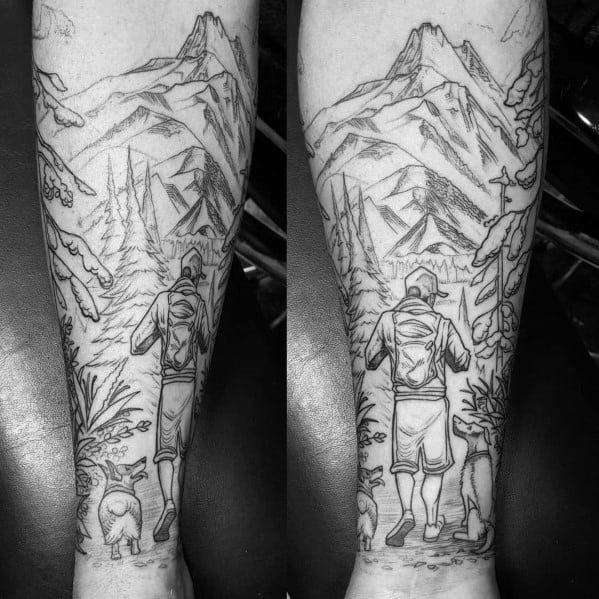 Black and white hiking tattoo featuring a backpacker and dog on a forest trail with towering mountains, symbolizing adventure and nature.