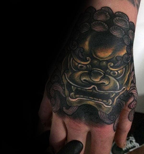 Hold And Black Shaded Foo Dog Mens Hand Tattoos