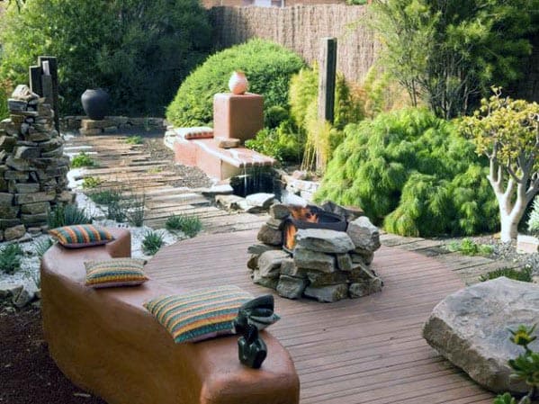 layered natural stone deck firepit