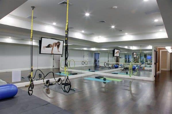 basement gym with TRX
