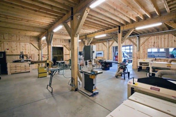 wood plank walls and ceiling large workshop concrete flooring