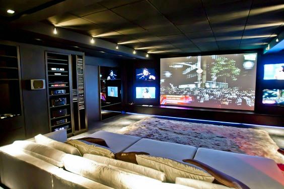 large home theater with track lighting 
