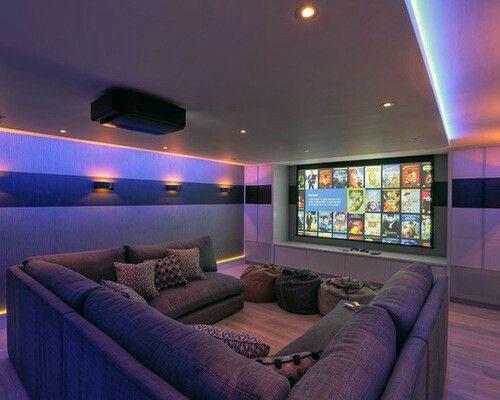 double sided wall sconces in small home theater room 