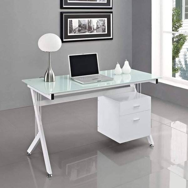 A clean, minimalist workspace featuring a glass desk with a laptop, simple white storage, and natural light, promoting clarity and focus.