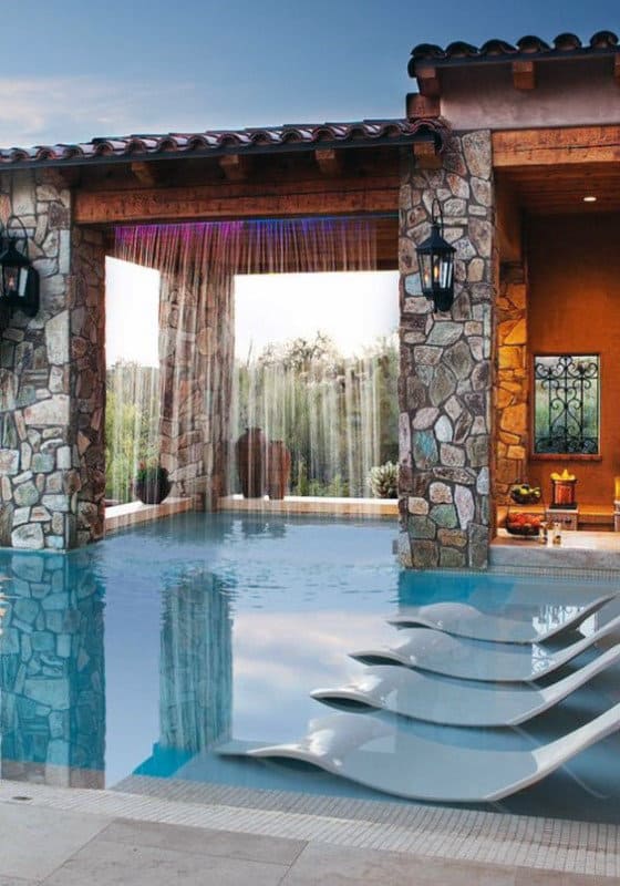 Home Swimming Pool With Waterfall From Rooftop