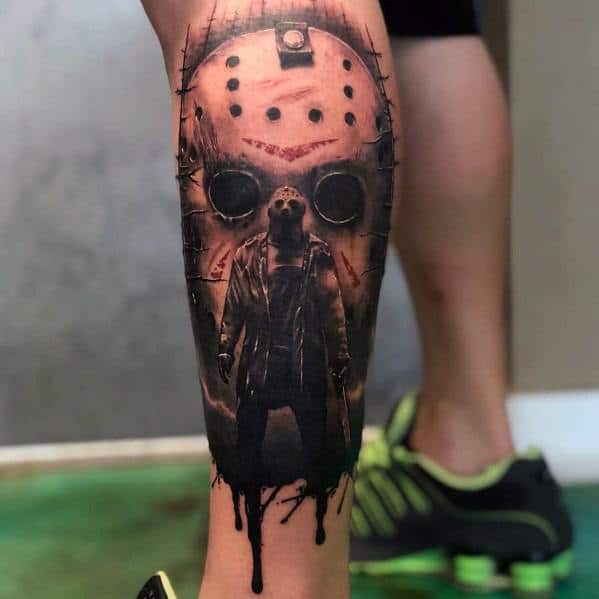 Realistic horror tattoo of Jason Voorhees, featuring his iconic hockey mask with eerie shading and a dark, menacing silhouette below for a chilling effect.