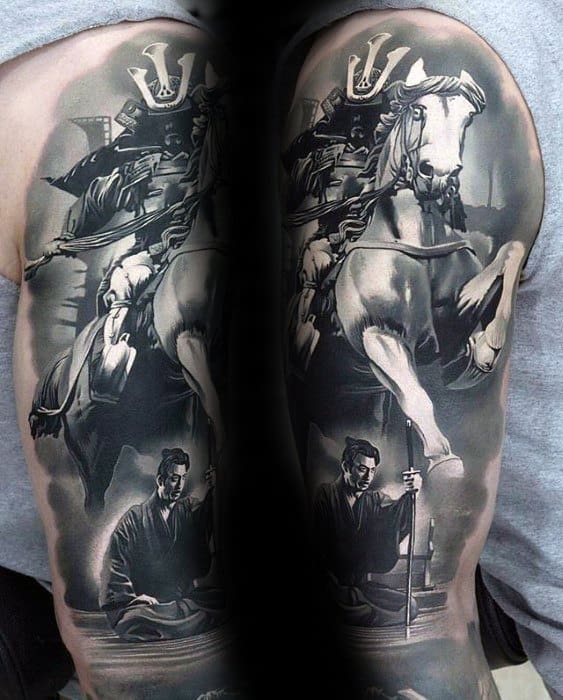 Epic full-back black and grey tattoo of a samurai on horseback above a kneeling warrior, featuring dramatic lighting and fine detail