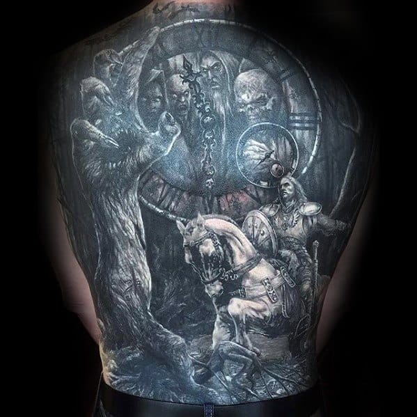Dark fantasy full back tattoo featuring a warrior on horseback facing a monstrous wolf, with a clock and ghostly faces in the background