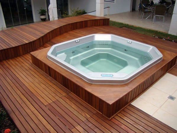 hot tub stained wood deck