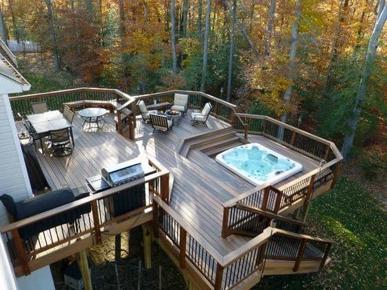 luxurious elevated wood deck hot tub fire pit outdoor furniture