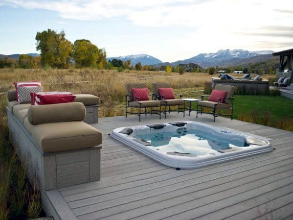 wood deck with bench seats sunken hot tub