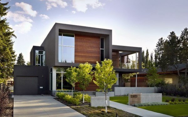 Contemporary house with clean lines, wooden accents, and minimalist landscaping.