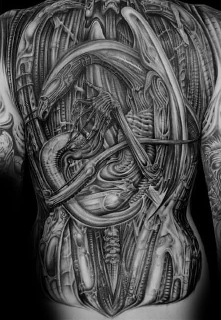 Full-back HR Giger-inspired tattoo featuring biomechanical alien forms, skeletal details, and complex mechanical structures intertwined.