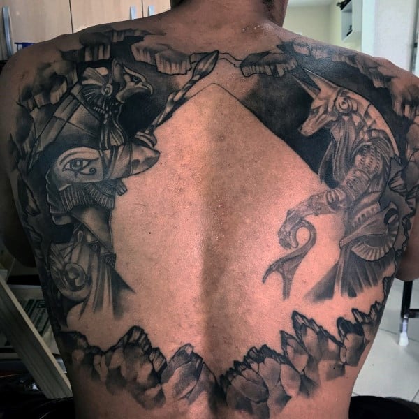 Huge Pyramid Negative Space Guys Anubis Tattoo On Back