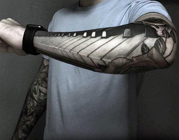 Hyper Realistic Male Forearm Paino Keys Sleeve Tattoo With White Ink Design