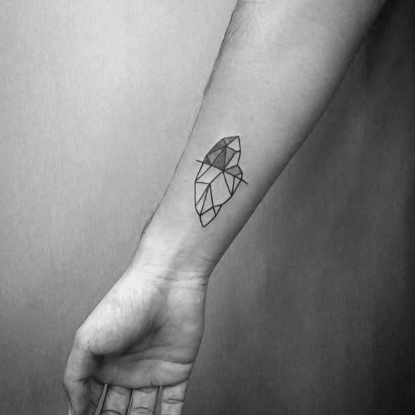 Minimalist iceberg tattoo on the forearm with clean geometric lines and subtle shading above the waterline.