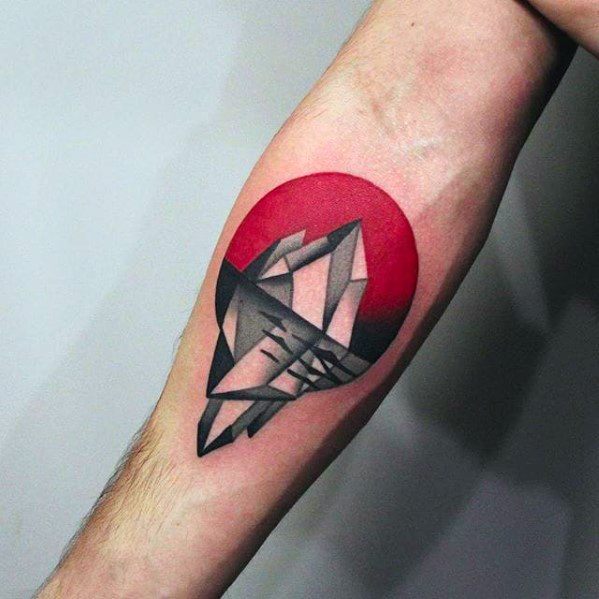 Geometric iceberg tattoo with sharp shading and a bold red circle background, symbolizing contrast between calm and intensity.
