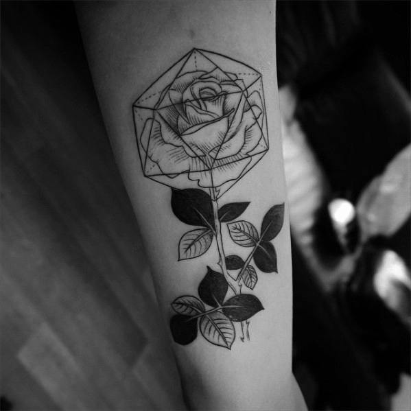 Rose and icosahedron tattoo on forearm combining delicate floral linework with bold geometric framing for a modern, artistic look.