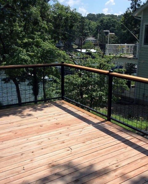 modern wood deck with metal mesh railing