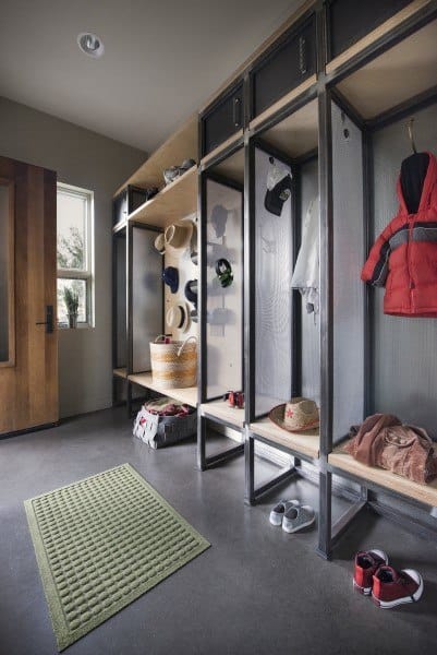 modern mudroom with hooks for clothes and shoe storage