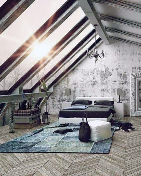 A sunlit attic loft with slanted glass windows, modern decor, and a large bed on a patterned rug