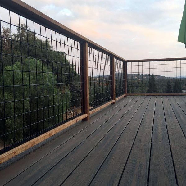 rustic wood deck railing with metal mesh