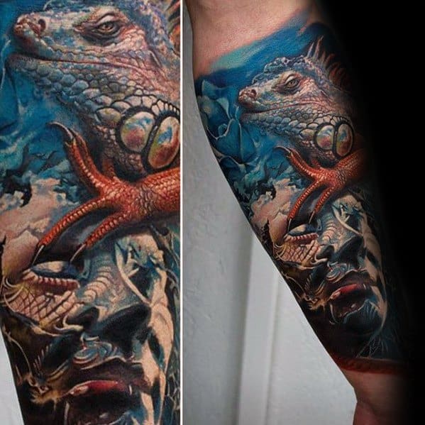 Surreal iguana sleeve tattoo with vivid blue background, red claw details, and a realistic woman's face blended into the design.