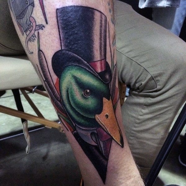 Illustrative American Traditional Mallard Duck Wearing Tophat Tattoo On Guy