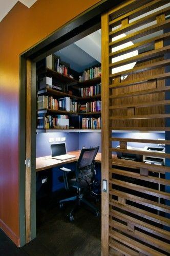 large closet office with sliding door