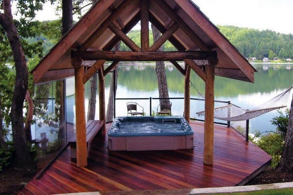 wood deck with hot tub on river pergola hammock