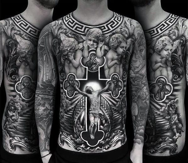Black and grey full-body tattoo featuring a highly detailed crucifixion scene, cherubs, religious figures, and intricate shading for a dramatic and spiritual design.