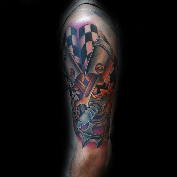 Vibrant tattoo featuring a checkered flag, pistons, and mechanical gears, symbolizing speed, power, and a deep passion for racing.