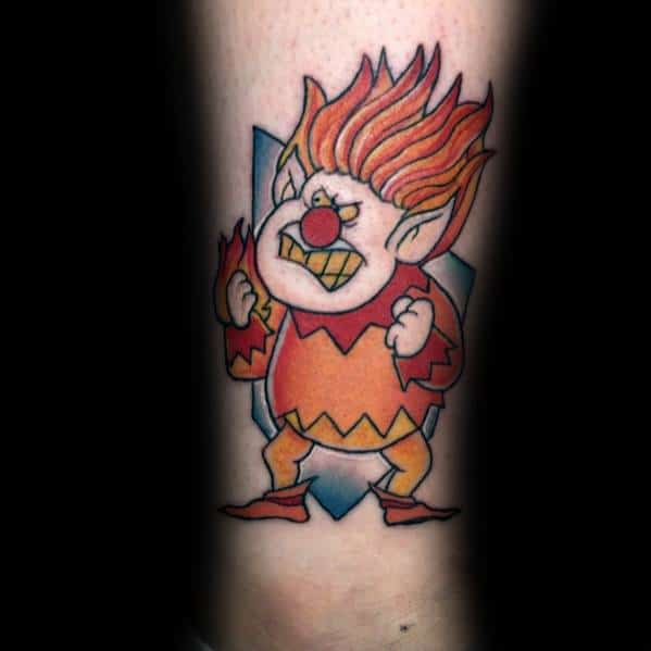 Christmas tattoo of Heat Miser from *The Year Without a Santa Claus*, featuring his fiery hair, mischievous grin, and classic cartoon-style design.