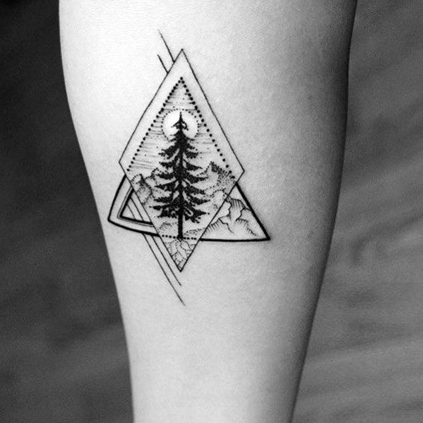 Geometric Christmas tree tattoo with layered triangles, fine dot work, and a mountain landscape, creating a modern and artistic design.