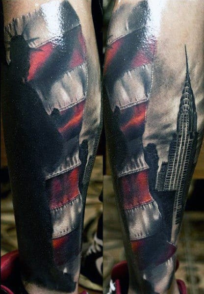 Realistic Chrysler Building tattoo with a torn American flag and Statue of Liberty silhouette, creating a bold patriotic New York tribute.