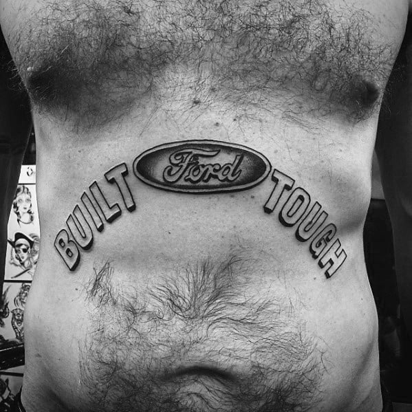 Bold "Ford Built Tough" tattoo on the stomach, featuring the iconic Ford oval logo with strong lettering in a dynamic arched design.