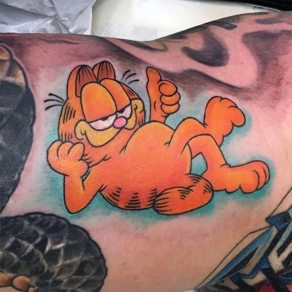 Garfield tattoo lounging with a smug grin and thumbs up, outlined in blue for a bold and relaxed vibe—perfect for a chill design.