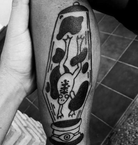 Black ink lava lamp tattoo featuring a whimsical floating frog, great for playful men's tattoo inspiration.