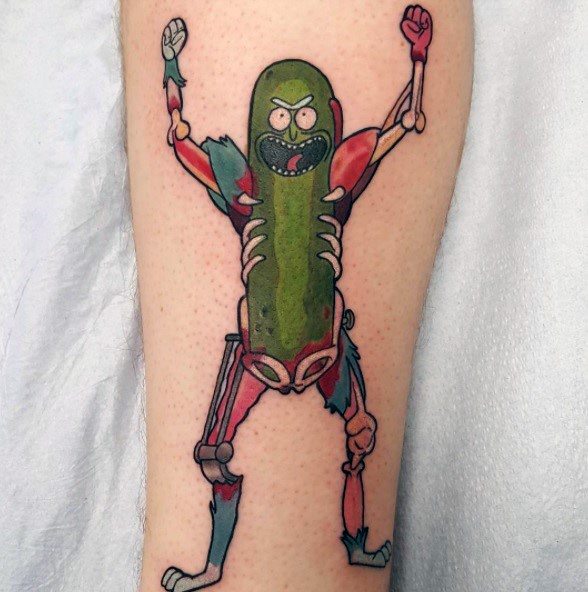 Pickle Rick tattoo in full cyborg form, featuring bold colors, biomechanical limbs, and an intense expression on the lower leg.