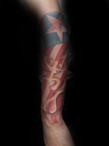 Puerto Rican flag tattoo on the forearm with a 3D effect, featuring an anchor intertwined with red, white, and blue stripes and a bold star.