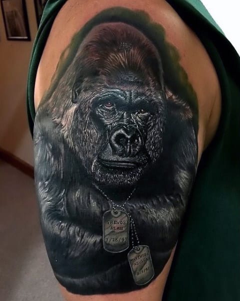 Impressive Mens Gorilla With Dog Tags Tattoo On Upper Arm