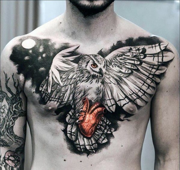 Black and grey 3D chest tattoo of a detailed owl with outstretched wings, clutching a realistic red anatomical heart under a full moon.