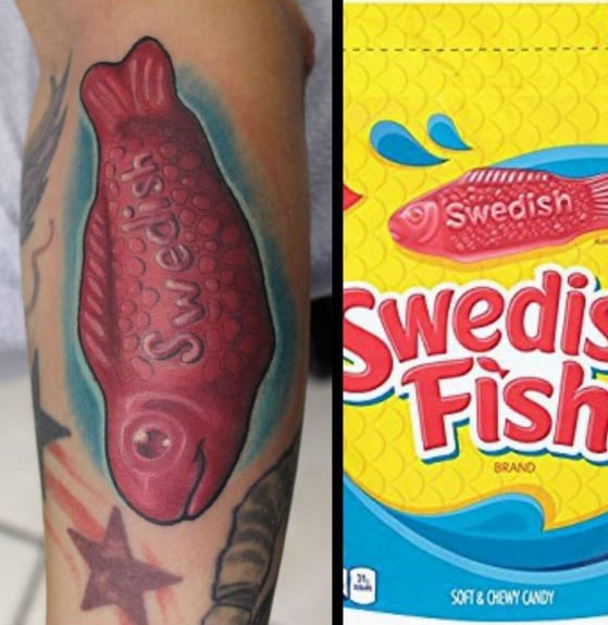 Realistic Swedish Fish tattoo with detailed shading and highlights, creating a lifelike gummy candy effect with bold red tones.