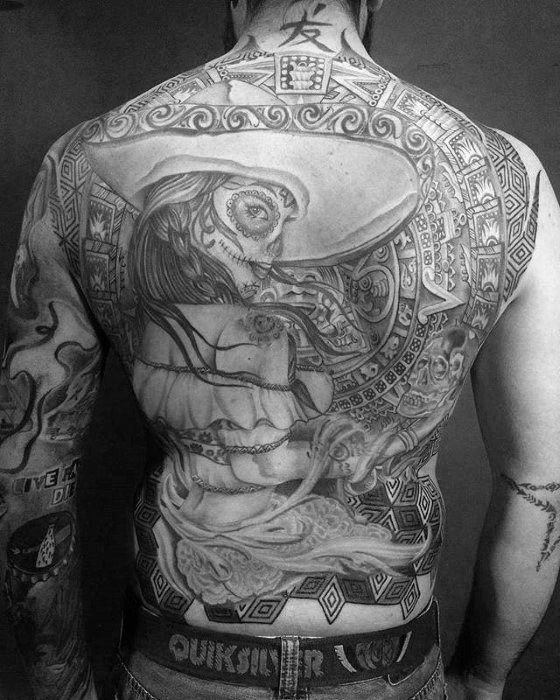 Full back La Catrina tattoo of a woman in a sombrero with sugar skull makeup, surrounded by Aztec-inspired patterns and intricate detailing.