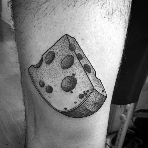 Black and gray tattoo of a wedge of Swiss cheese, featuring bold outlines, dot work shading, and a realistic texture for depth and dimension.