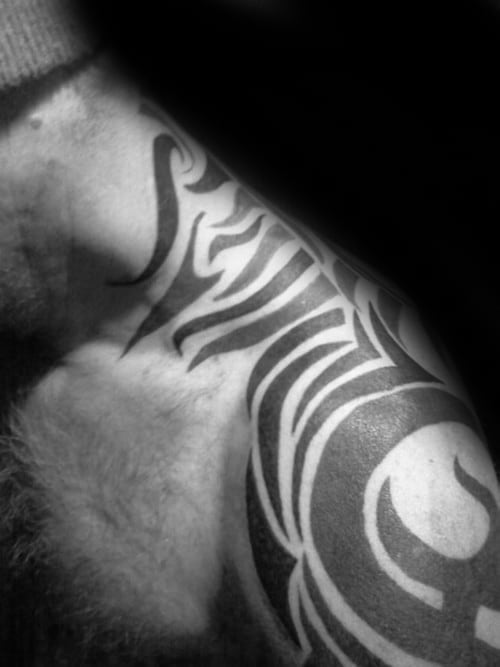 Incredible Classic Tribal Neck Tattoos For Men