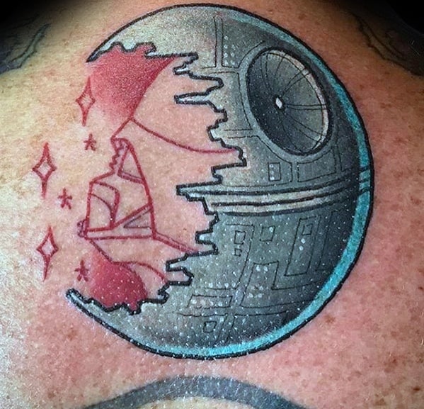 Unique Death Star tattoo featuring Darth Vader's red helmeted profile split with galactic details